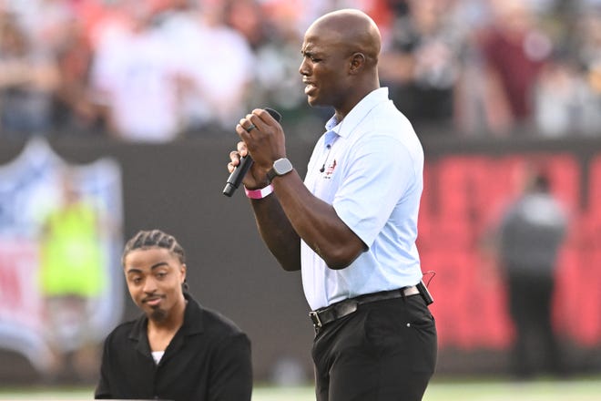Aug. 3: 2023 Pro Football Hall of Fame inductee DeMarcus Ware sings the national anthem before the Hall of Fame Game between the Cleveland Browns and New York Jets at Tom Benson Hall of Fame Stadium in Canton, Ohio.