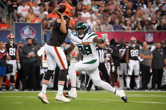 Aug. 3: New York Jets defensive end Will McDonald IV (99) pressures Cleveland Browns quarterback Kellen Mond (7) during the first half of the Hall of Fame Game.