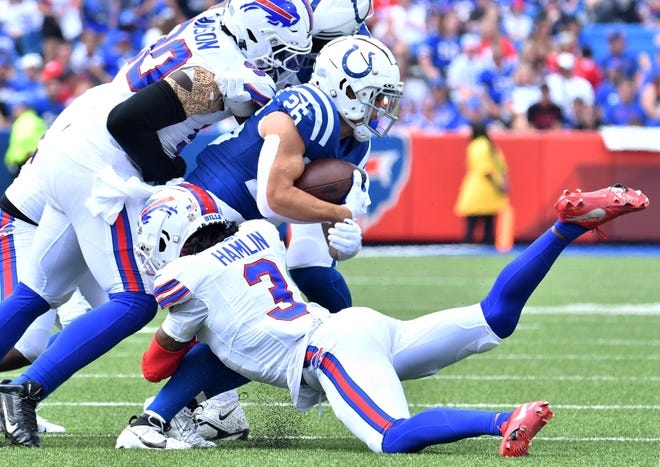 Aug. 12: Buffalo Bills safety Damar Hamlin (3) makes a tackle against Indianapolis Colts running back Evan Hull (26) during the first quarter of a preseason game at Highmark Stadium in Orchard Park, New York.