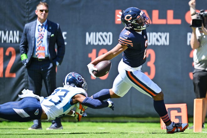 Aug 12: Chicago Bears wide receiver DJ Moore scores on a 62-yard touchdown during the first quarter against the Tennessee Titans at Soldier Field in Chicago.