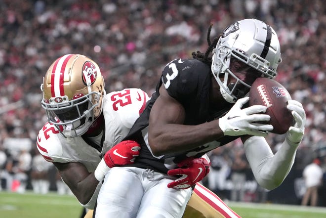 Aug. 13: Las Vegas Raiders wide receiver Kristian Wilkerson (83) catches the ball against San Francisco 49ers cornerback D'Shawn Jamison in the second half at Allegiant Stadium.
