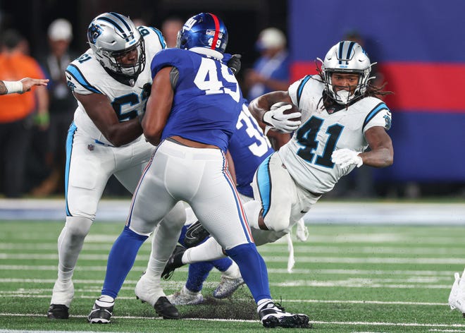 Aug. 18: Carolina Panthers running back Spencer Brown (41) carries the ball during the first half against the New York Giants.