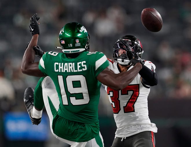 Aug. 19: Tampa Bay Buccaneers cornerback Anthony Chesley (37) breaks up a pass intended for New York Jets wide receiver Irvin Charles (19) in the second half.