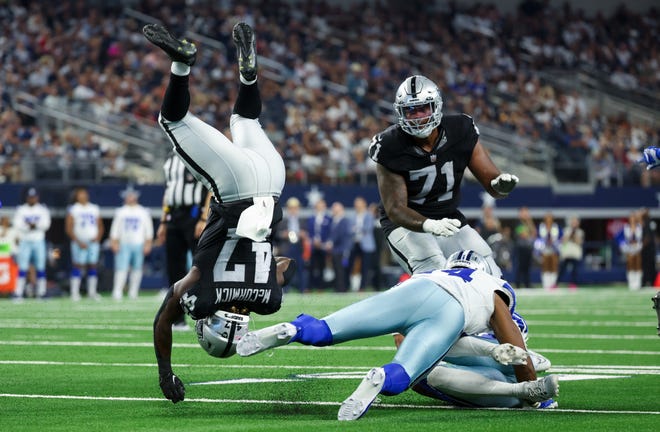 Aug. 26: Las Vegas Raiders running back Sincere McCormick flips during the game against the Dallas Cowboys.
