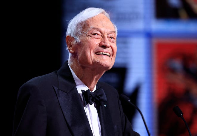 US film director and producer Roger Corman speaks on stage to present the Grand Prix during the closing ceremony of the 76th edition of the Cannes Film Festival in Cannes, southern France, on May 27, 2023. American B-movie director and producer Roger Corman, best known for churning out hundreds of low-budget films and giving some of Hollywood's biggest stars their early breaks, has died at the age of 98, US media reported on May 11.