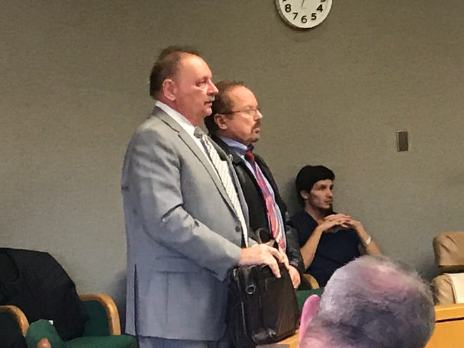 Dr. Larry Richard Pyle, right, stands with his attorney, John Kucera, on Tuesday in Shasta County Superior Court.