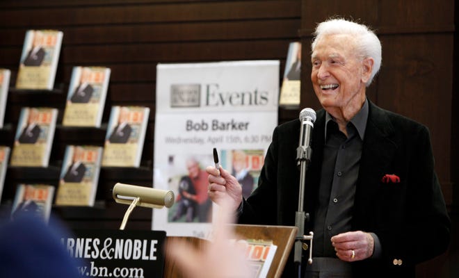 Barker answers questions from LA fans at a book signing of his memoir "Priceless Memories" on April 15, 2009.