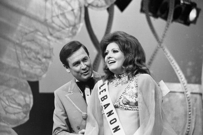 Georgina Rizk, from Beirut, is named Miss Universe by pageant host Bob Barker at the Miami Beach Auditorium on July 24, 1971.