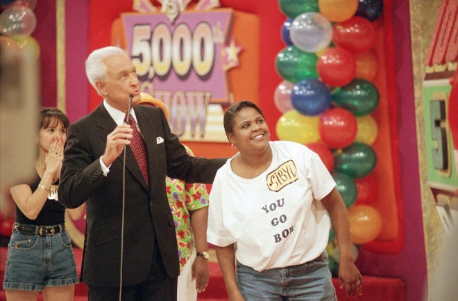 Contestants vie for prizes at the game show's 5,000th taping, March 11, 1998. After 26 years of taping Barker's show on the same sound stage, CBS re-dedicated the location as the Bob Barker Studio.