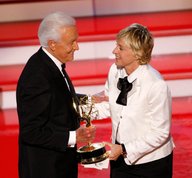 Bob Barker accepts the award for outstanding game show host from Ellen DeGeneres at the 34th Annual Daytime Emmy Awards on  June 15, 2007.