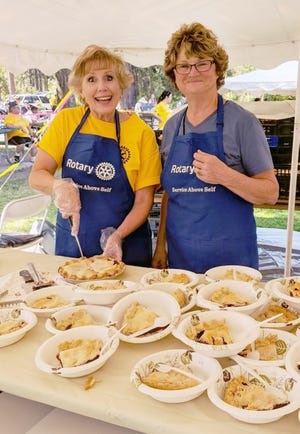 Rotarians sell blackberry pie by the slice, with or without ice cream, at a past Blackberry Music Festival in Mount Shasta.