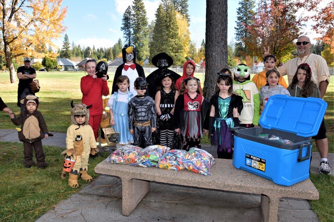 Halloween came to Hoo Hoo Park in McCloud on Oct. 31, 2021, as children who dressed up in costumes participated in the annual McCloud Treasure Hunt and costume contest hosted by Quentin Zahara (right).