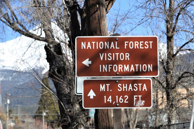 Sign points the way to Mt. Shasta, the volcano, near the Mount Shasta Ranger Station in Mount Shasta, the city.