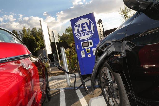 Electric vehicles power up at the new ZEV Station charger at the Palm Springs Art Museum on Sept. 28.
